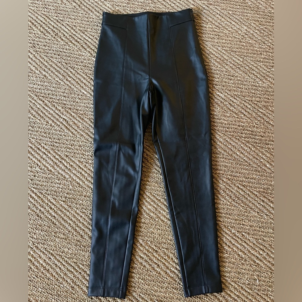 Black faux leather Ann Taylor leggings.